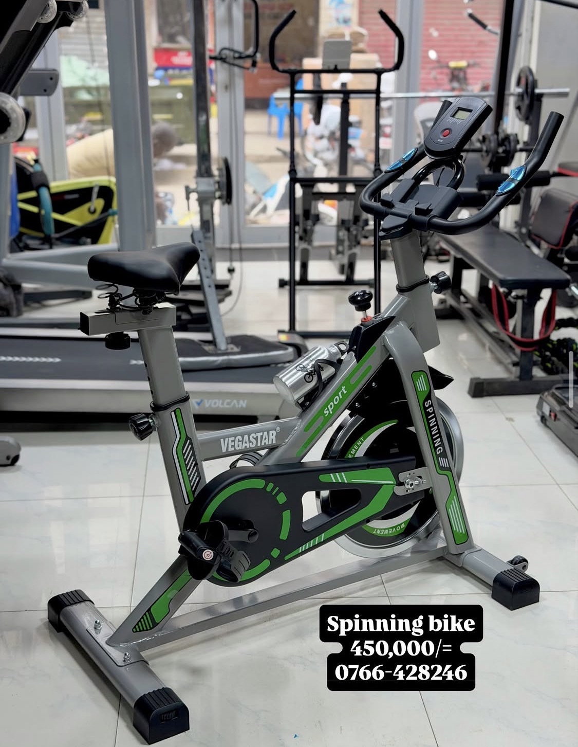 Green spinning bike
